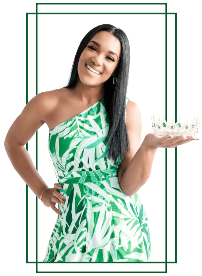 Tara Levine in a green and white leaf-patterned blouse, holding a crown